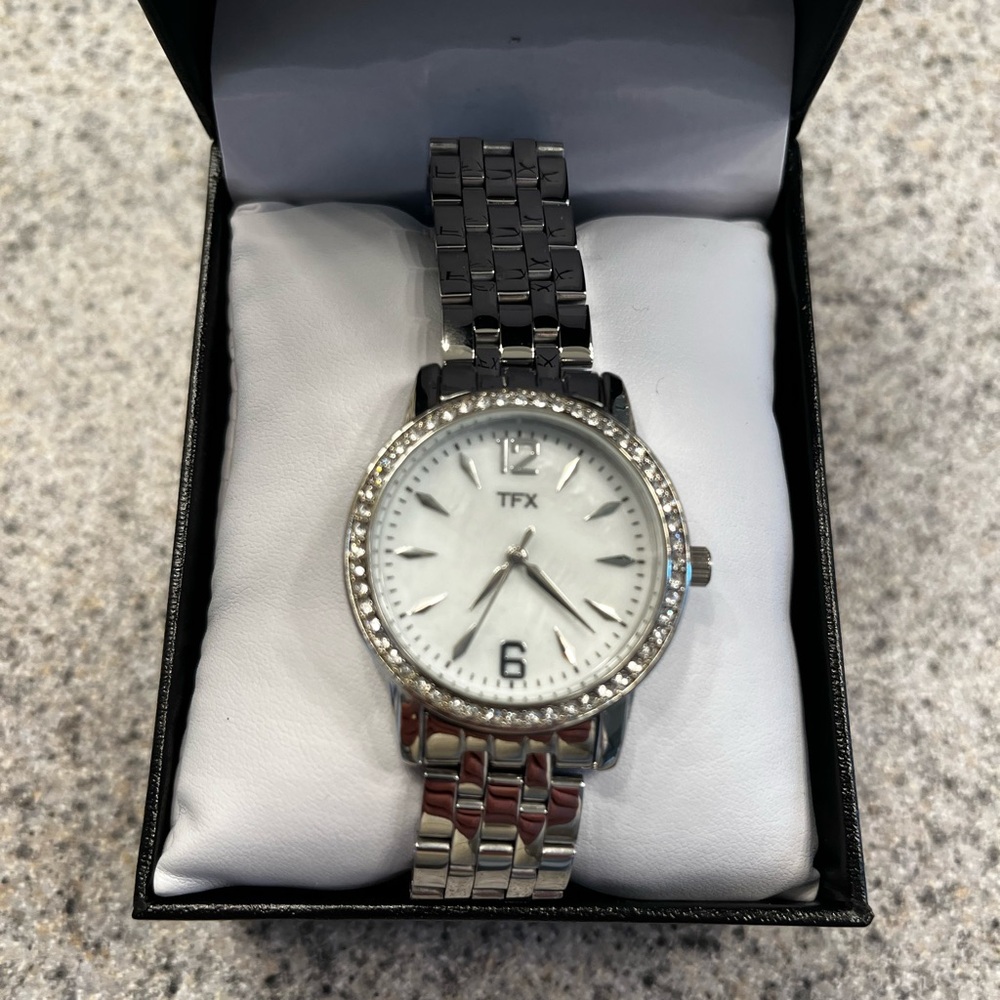 New, in box never worn TFX watch